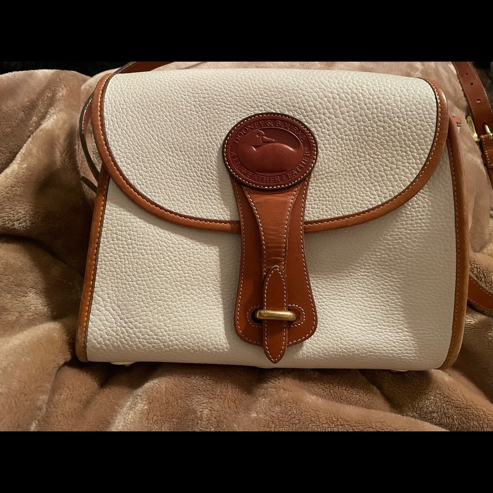 SOLD on Merc. Dooney and Burke all weather crossbody